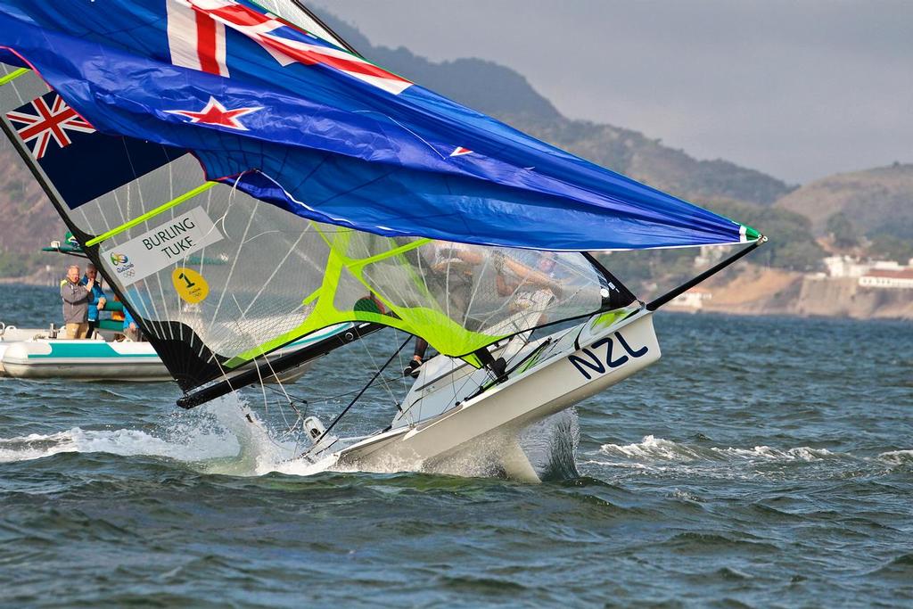 Peter Burling, Blair Tuke spin the 49er on its tail after crossing the finish line and winning the Gold Medal at the 2016 Sailing Olympics  - 49er Medal Race 2016 Olympics © Richard Gladwell www.photosport.co.nz